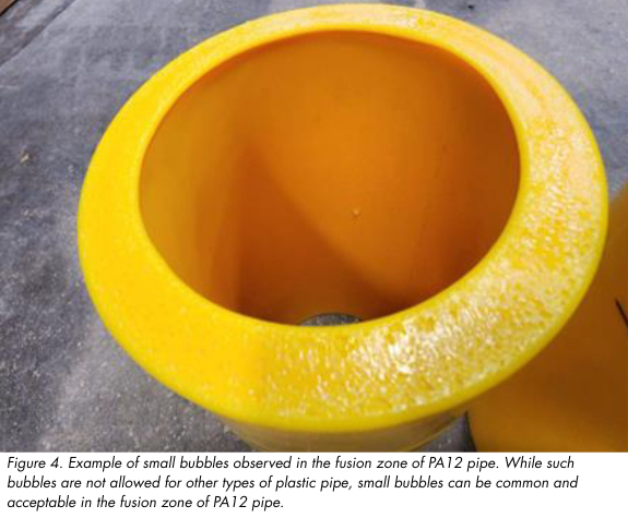 Figure 4. Example of small bubbles in the fusion zone of P A12 pipe