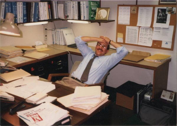 Well dressed man sitting in office